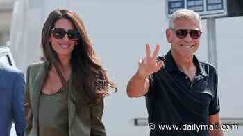 George Clooney is the perfect gentleman as he helps wife Amal disembark from a water taxi while making a glamorous arrival at the Venice Film Festival ahead of his Lifetime Achievement Award