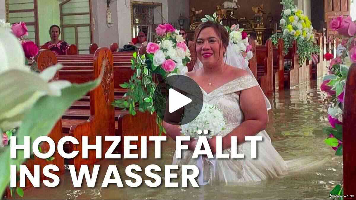 Hochzeitsvideo im Hochwasser: Braut watet durch überflutete Kirche