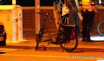 Fietser hard ten val op de Herebrug