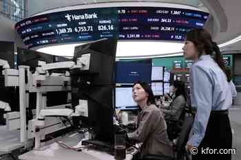 Stocks slip on Wall Street under pressure from higher oil prices and rising bond yields
