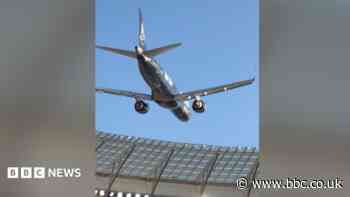 South African airline defends low-altitude aerial stunt over packed stadium