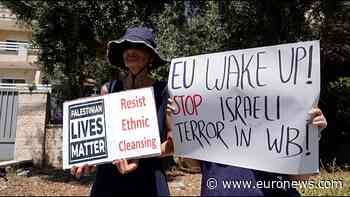 Israeli activists protest outside EU offices in Jerusalem over Gaza war