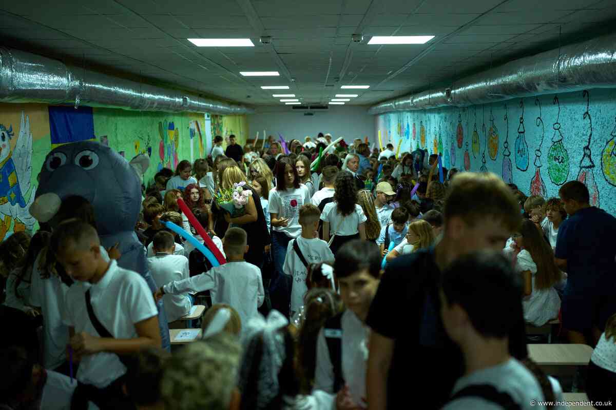 Ukraine’s children begin school year with balloons and missiles overhead