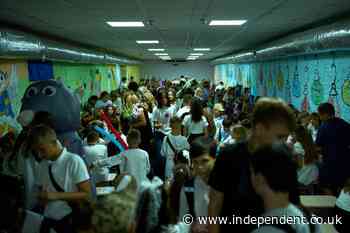 Ukraine’s children begin school year with balloons and missiles overhead