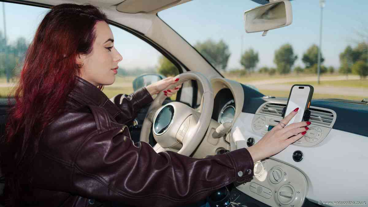 Lawyer explains whether it's legal to touch your phone in a holder while driving