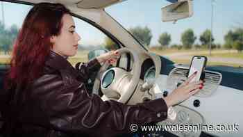 Lawyer explains whether it's legal to touch your phone in a holder while driving