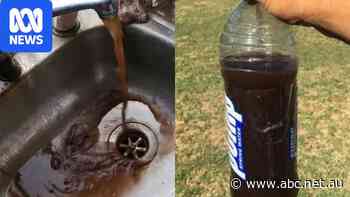 Brown and foul tasting: This town's water may be the tipping point of a crisis