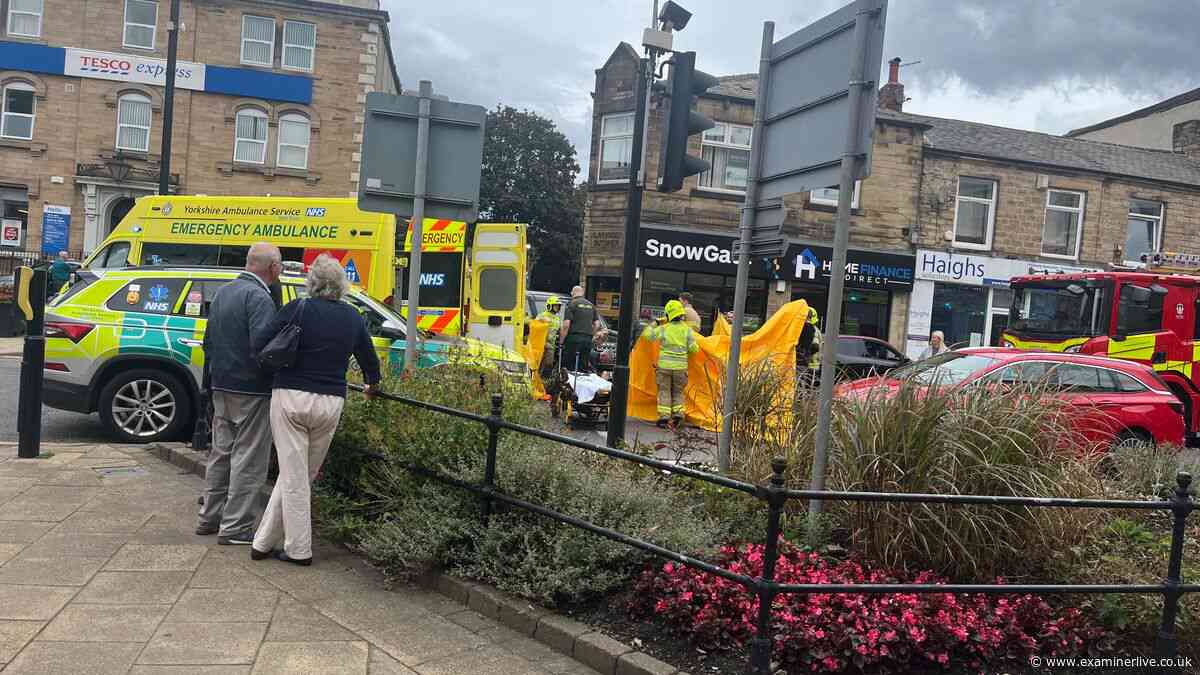 Cyclist trapped underneath vehicle in Mirfield crash