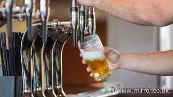 Man orders drink at hotel bar then familiar face sits next to him and joins