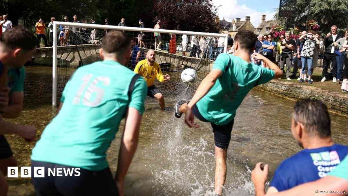 Hundreds gather to watch river football match