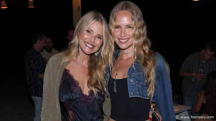 Christie Brinkley and Sailor Brinkley Cook twin in denim at John Mayer's show in New York