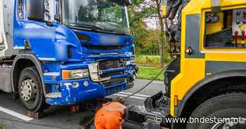 Vuilniswagen botst op vrachtwagen in Chaam, weg deels geblokkeerd