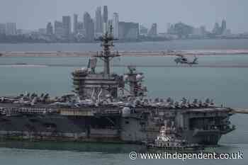 USS Lincoln docks with rusted metal and chipped paint after record-setting stint at sea