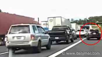 Satisfying moment entitled Subaru driver taught harsh lesson after trying to skip huge traffic line by driving on shoulder