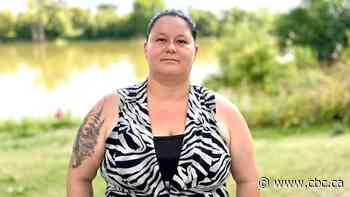 'I don't feel like a hero,' says Winnipeg woman who rescued father, toddler from Red River