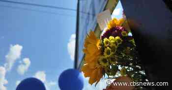 Small Georgia city mourns death of officer killed in motel shooting