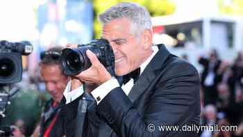 Smile, you're on ClooneyCam! Star turns snapper as he celebrates Venice film award with paparazzi