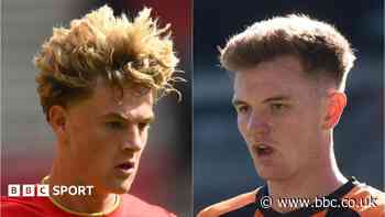 Grimsby loan in midfielders Cartwright and Shelton