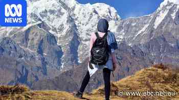 These guides lead tourists into the Himalayas; now they must carry something heavier