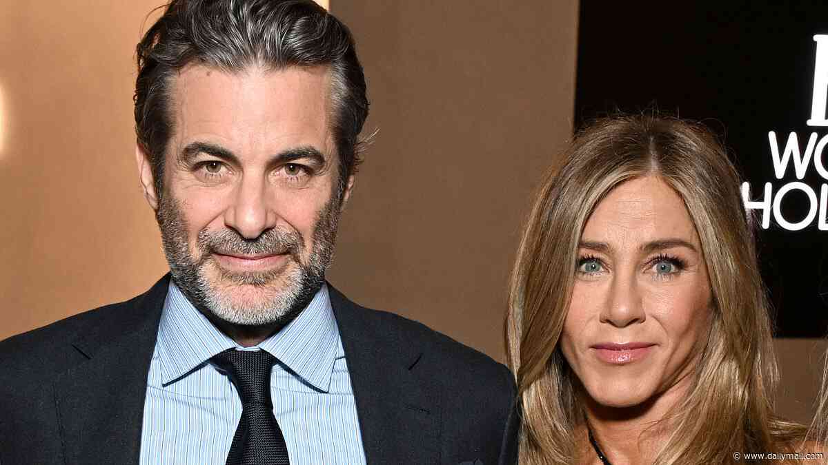 Jennifer Aniston makes very racy joke about boyfriend Jim Curtis while interviewing him in rare public moment in New York