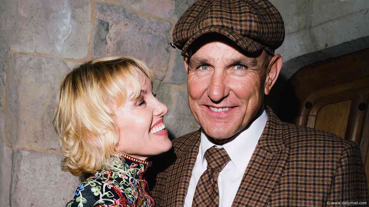 Vinnie Jones looks loved up with girlfriend Emma Ford at The Gentlemen afterparty - seven years after the death of his wife Tanya