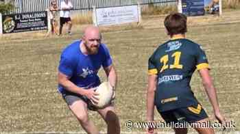 'Sore dads' put through their paces by West Hull Bobcats U14s in aid of charity