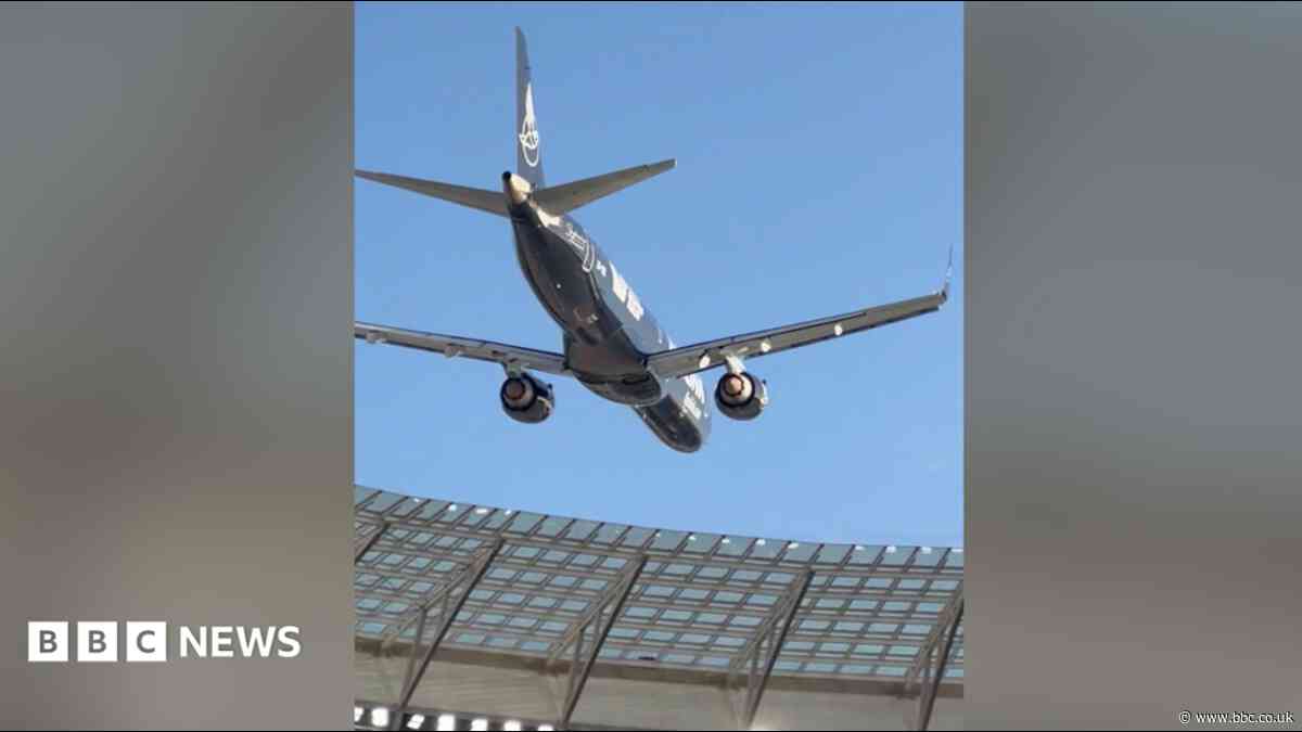 South African airline defends low-altitude aerial stunt over packed stadium