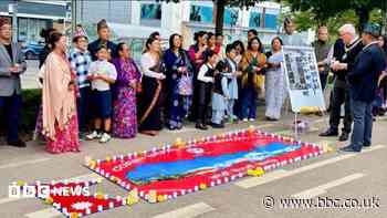 Community holds vigil for Nepal-Tibet flood victims