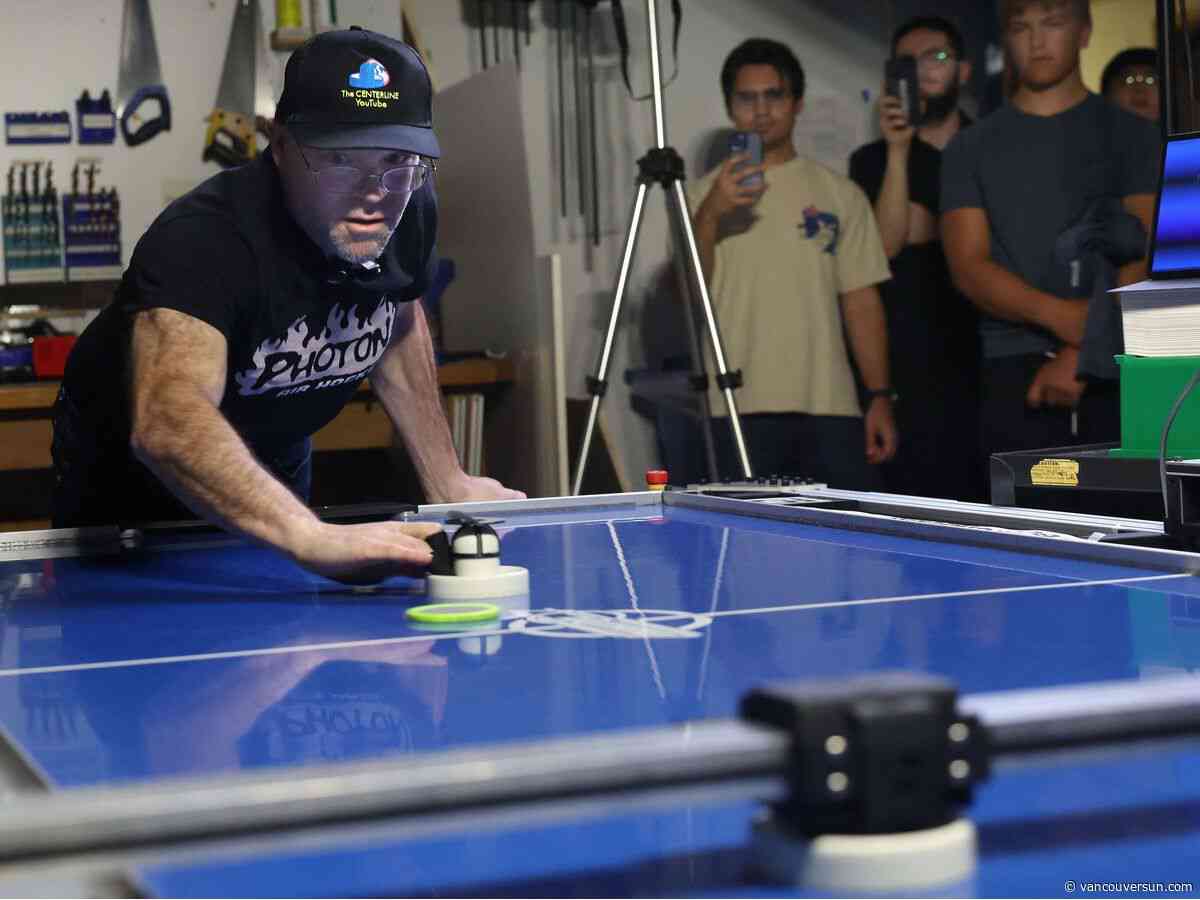 'Like a brick wall': Pro air hockey champs impressed by UBC robot