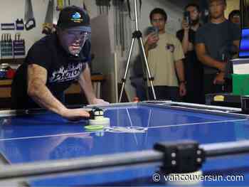 'Like a brick wall': Pro air hockey champs impressed by UBC robot