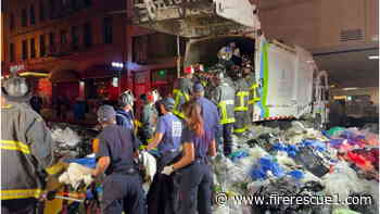 San Fransico firefighters empty garbage truck to rescue man trapped inside