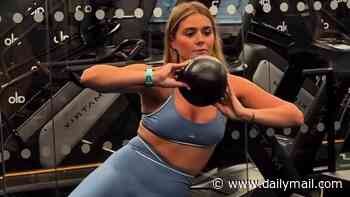 Tilly Ramsay shows off her abs in blue lycra gym wear as she takes on a gruelling Pilates session