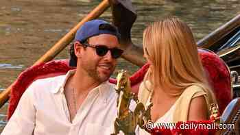 Sydney Sweeney and Scooter Braun passionately kiss as they enjoy a romantic gondola ride in Venice