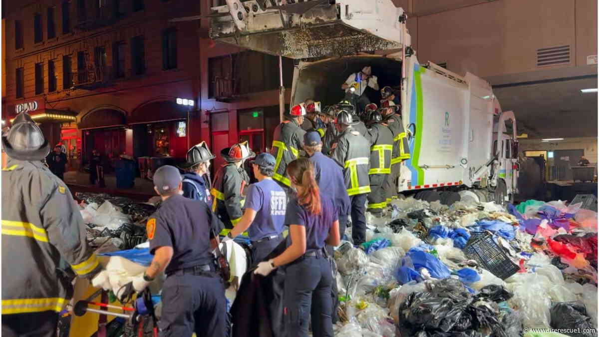 San Francsico firefighters empty garbage truck to rescue man trapped inside