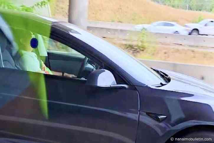 VIDEO: Tesla driver fined for allegedly sleeping in moving car on highway in Langley