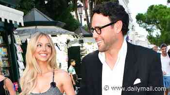 Sydney Sweeney looks completely in love with boyfriend Scooter Braun as they arrive at the Armani Beauty dinner during Venice Film Festival