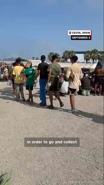 Hundreds of migrants build makeshift shelter on Ceuta beach