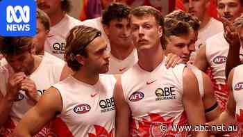 How Swans midfielder is supporting banned housemate amid trade rumours