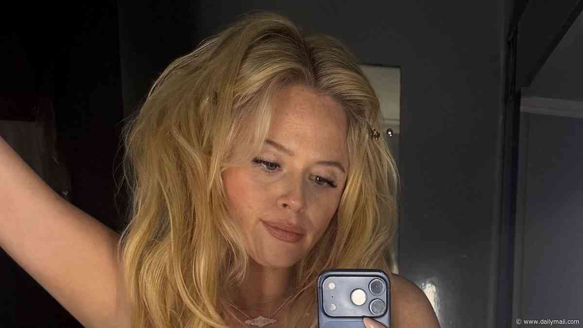 'August was a bit of alright': Emily Atack shows off her slim figure in bra before slipping into unitard as she celebrates the month she got married