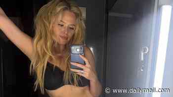 Emily Atack shows off her slim figure in bra before slipping into unitard as she celebrates the month she got married