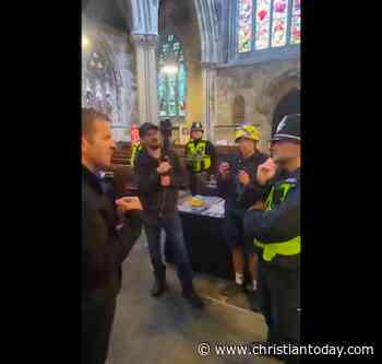 Apology issued after anti-immigration protesters confront clergyman inside church