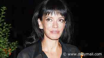 Lily Allen shows off her bra under a sheer shirt as she attends a private party with Troye Sivan in New York