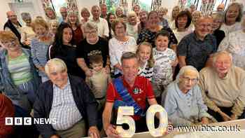 Village's first class birthday surprise for postie
