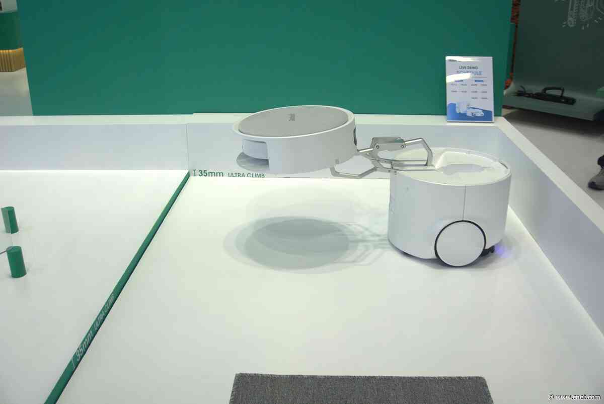 I Watched a Floor Washing Robot Mothership Deploy a Roomba Using a Mechnical Arm