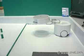 I Watched a Floor Washing Robot Mothership Deploy a Roomba Using a Mechnical Arm