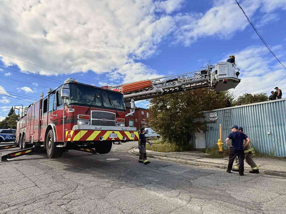 Sudbury police, emergency personnel rescue woman from rooftop