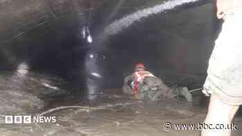 Nepal rescuers try to reach dozens trapped in tunnel after two found alive