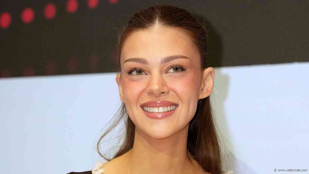Nicola Peltz makes her Venice Film Festival debut - but is an hour late because of her iconic diva co-star Faye Dunaway - ahead of being awarded her 'rising star' gong