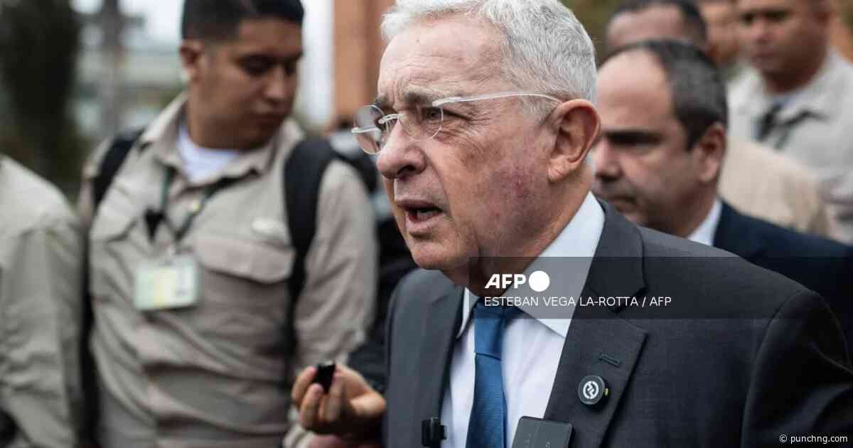 Ex-Colombian president denies role in 1990s massacres