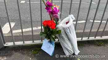 Tributes left at scene where woman died after being hit by taxi